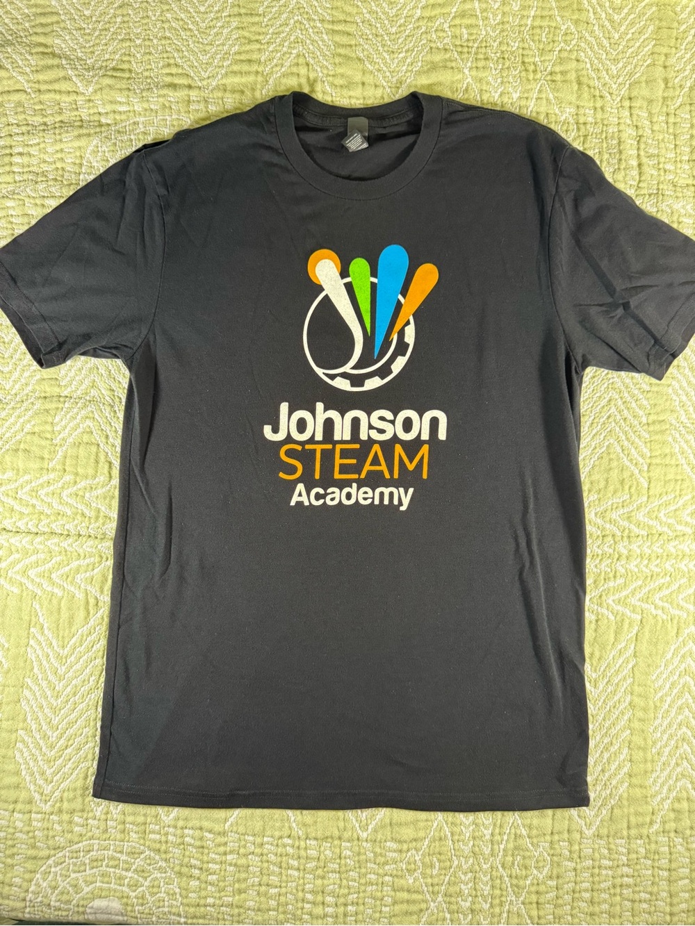 GUC Men’s Medium Johnson STEAM Academy black Tee Cedar Rapids Iowa